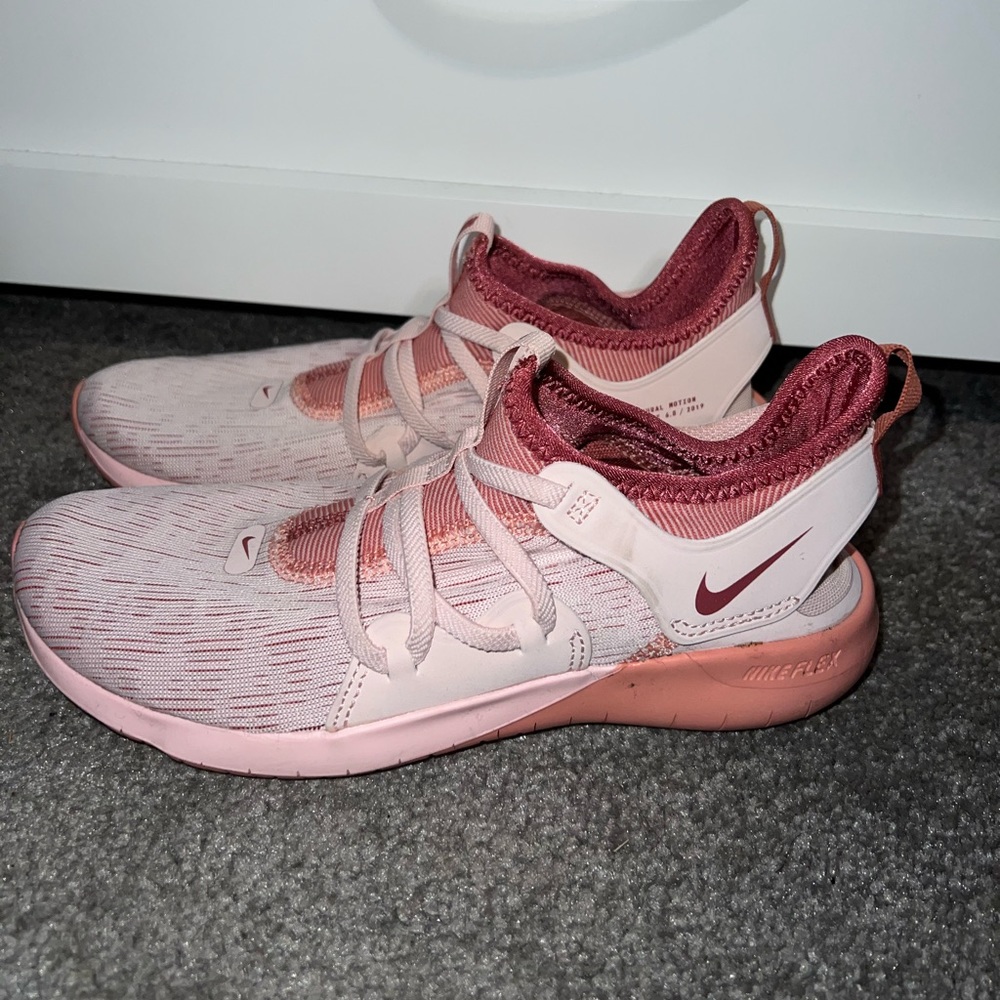 Pink Nike flex running shoe